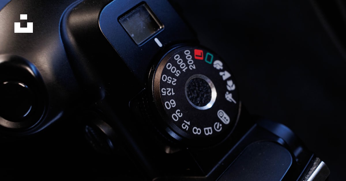 A close up of a camera on a table photo – Free Iso analog Image on Unsplash