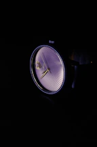 Close-up of a vintage watch dial with elegant hands and detailed markings.