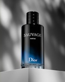 a bottle of dior sauvage on a shelf