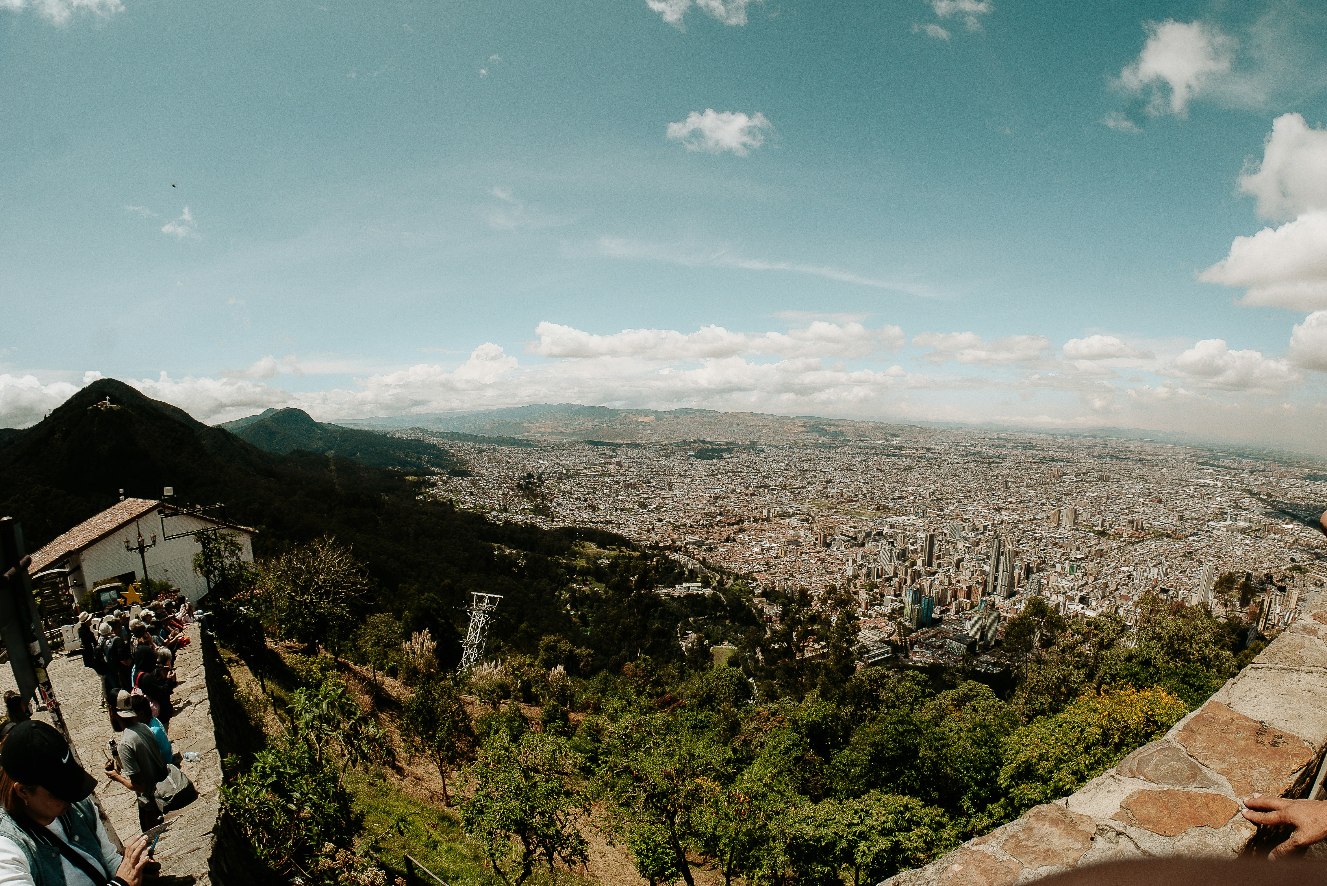 a group of people standing on top of a hill, vista panoramica desde monserrate Bogota, CL