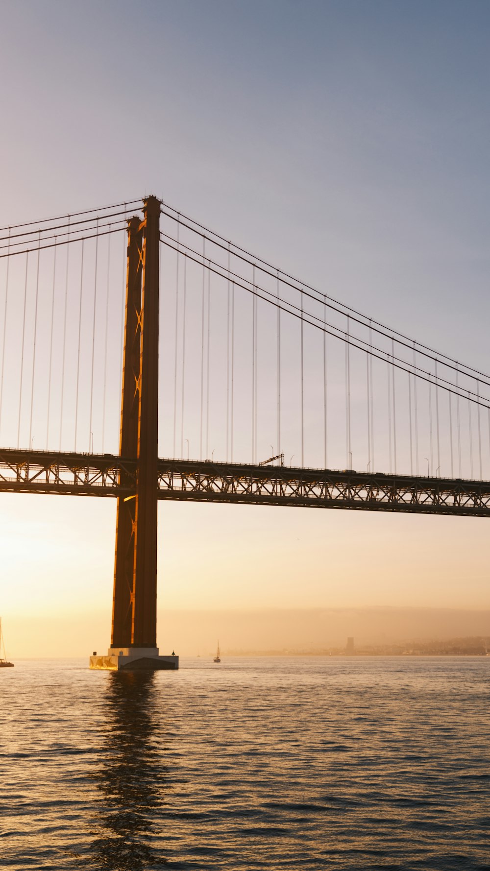 a large bridge spanning over a large body of water