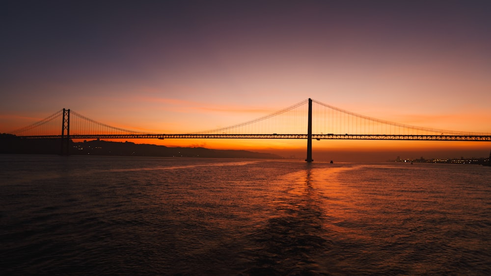 a large bridge spanning over a large body of water