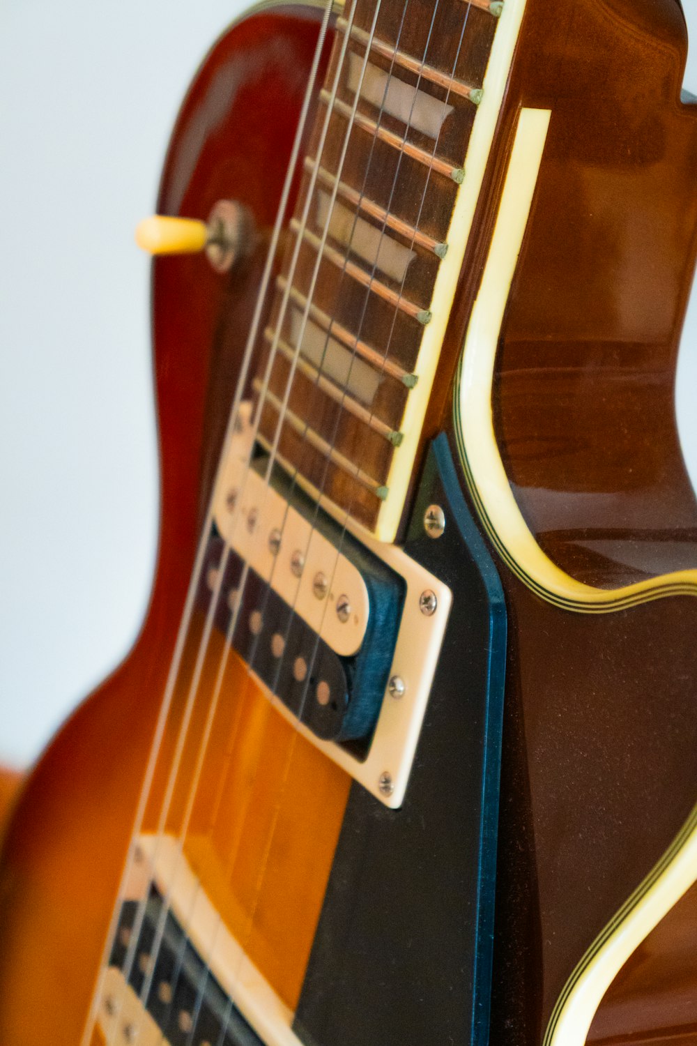 a close up of an acoustic guitar