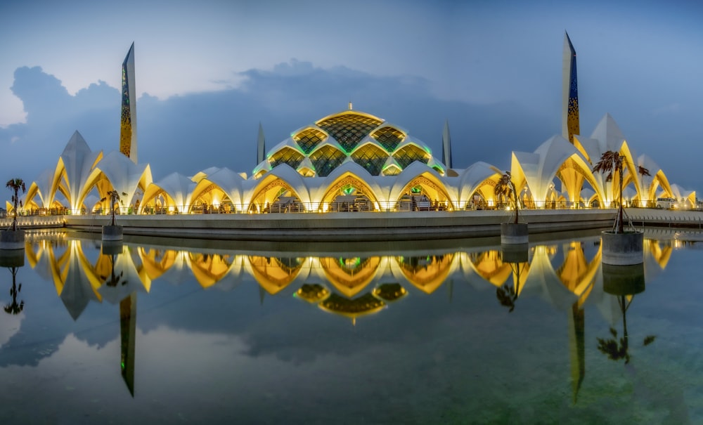 a large building that is next to a body of water