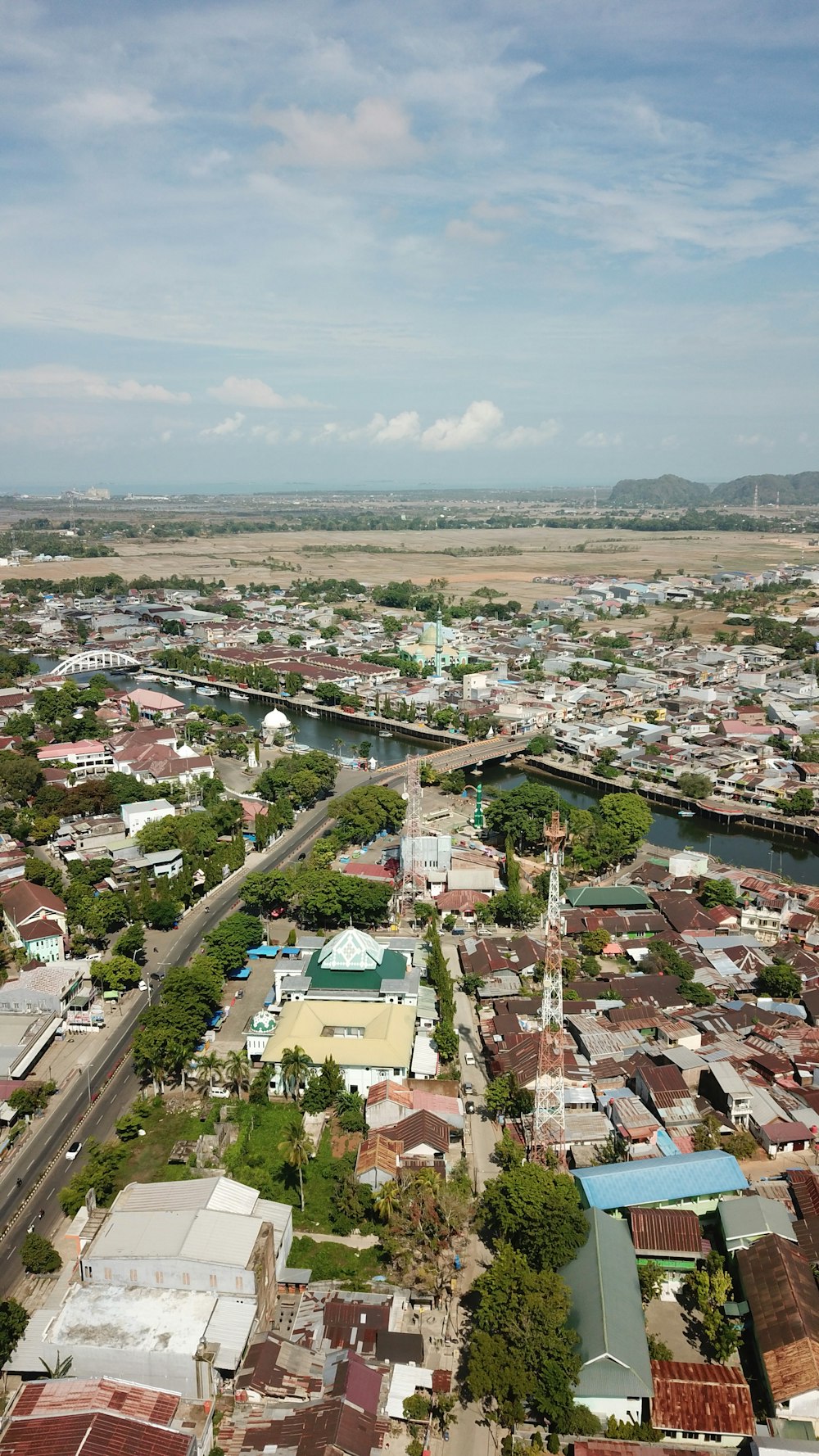 an aerial view of a city with a river running through it