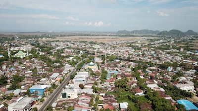 Aerial view of 14th Avenue at Gaur City, showcasing the layout and surrounding greenery.