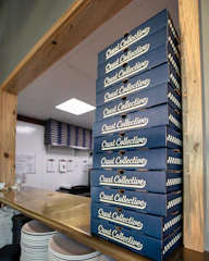 A neat stack of completed capstone projects with Culmen branding.