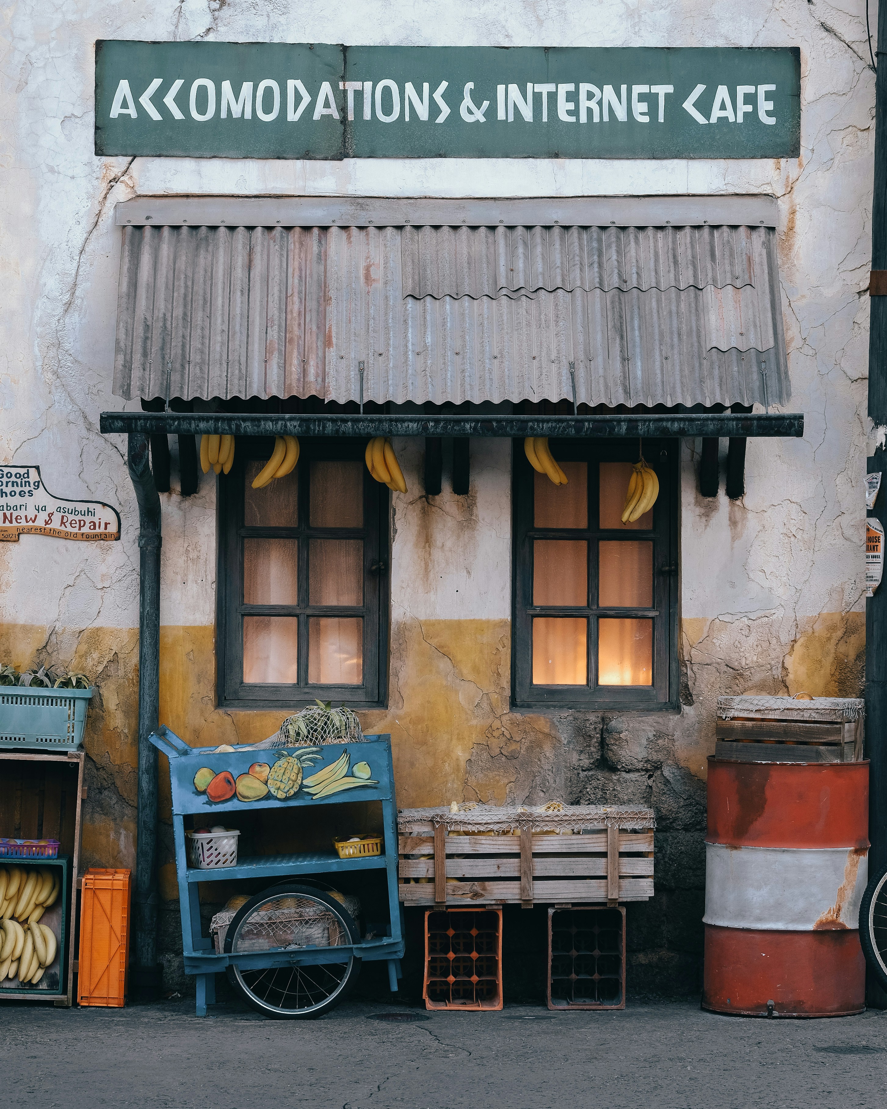 a building with a sign that says accomptionions and internet cafe