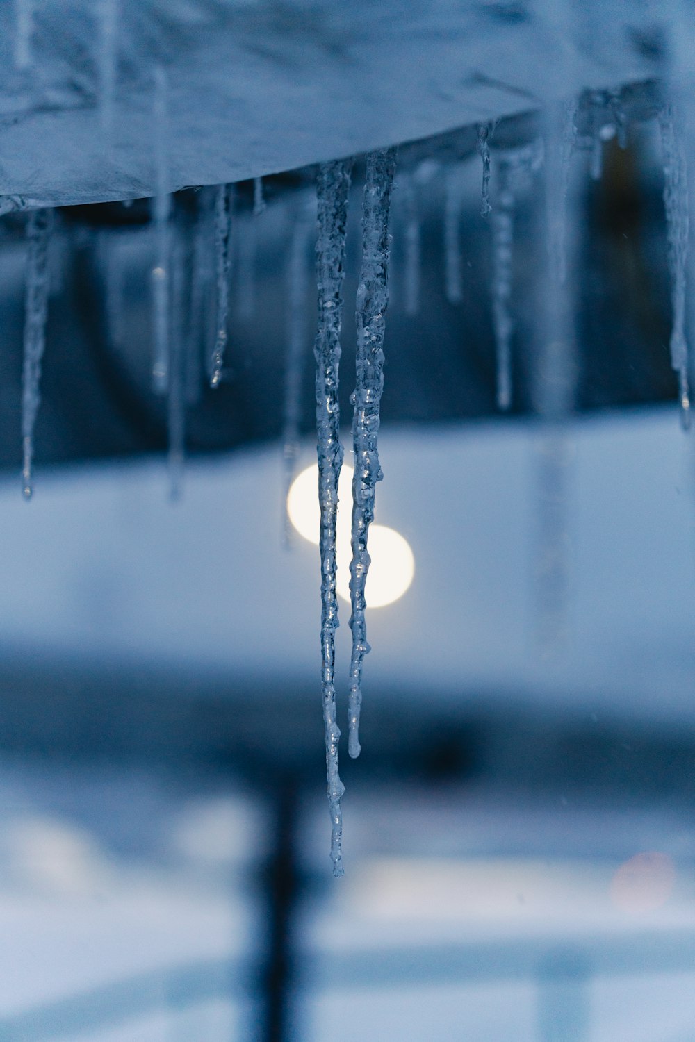 icicles hanging from the roof of a building