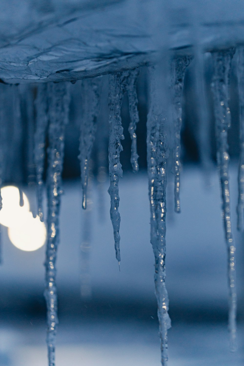 icicles hanging from the roof of a building