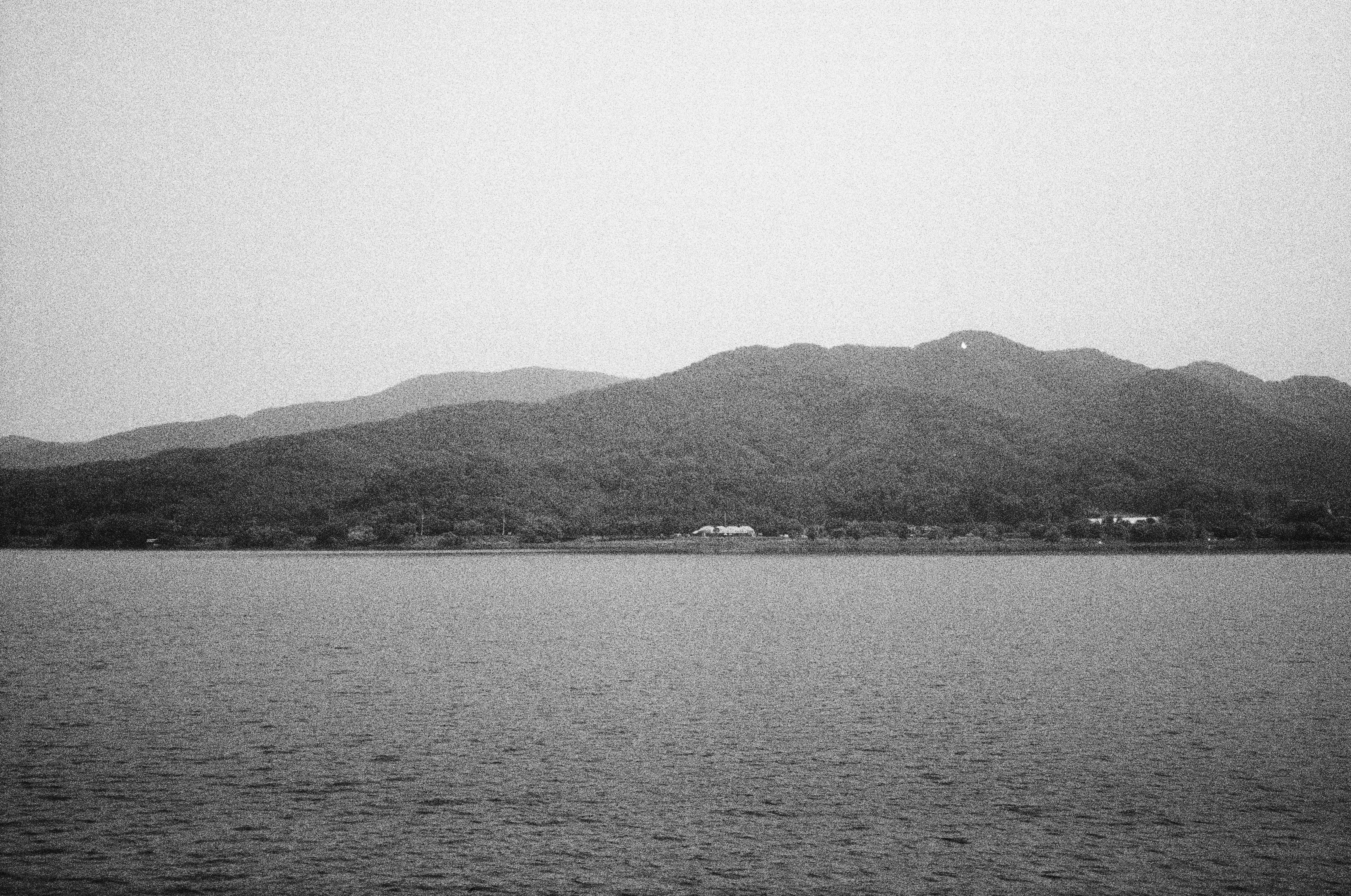 Scenic bluffs surrounding Table Rock Lake - Fishing Boat Missouri