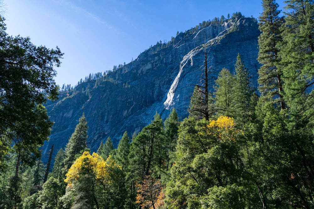 a mountain with a waterfall in the middle of it