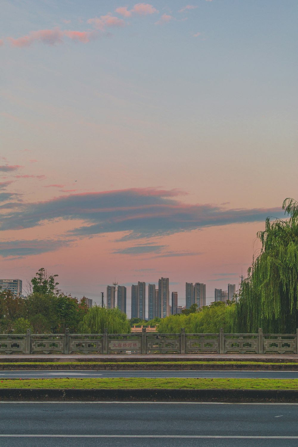 a view of a city with tall buildings in the distance