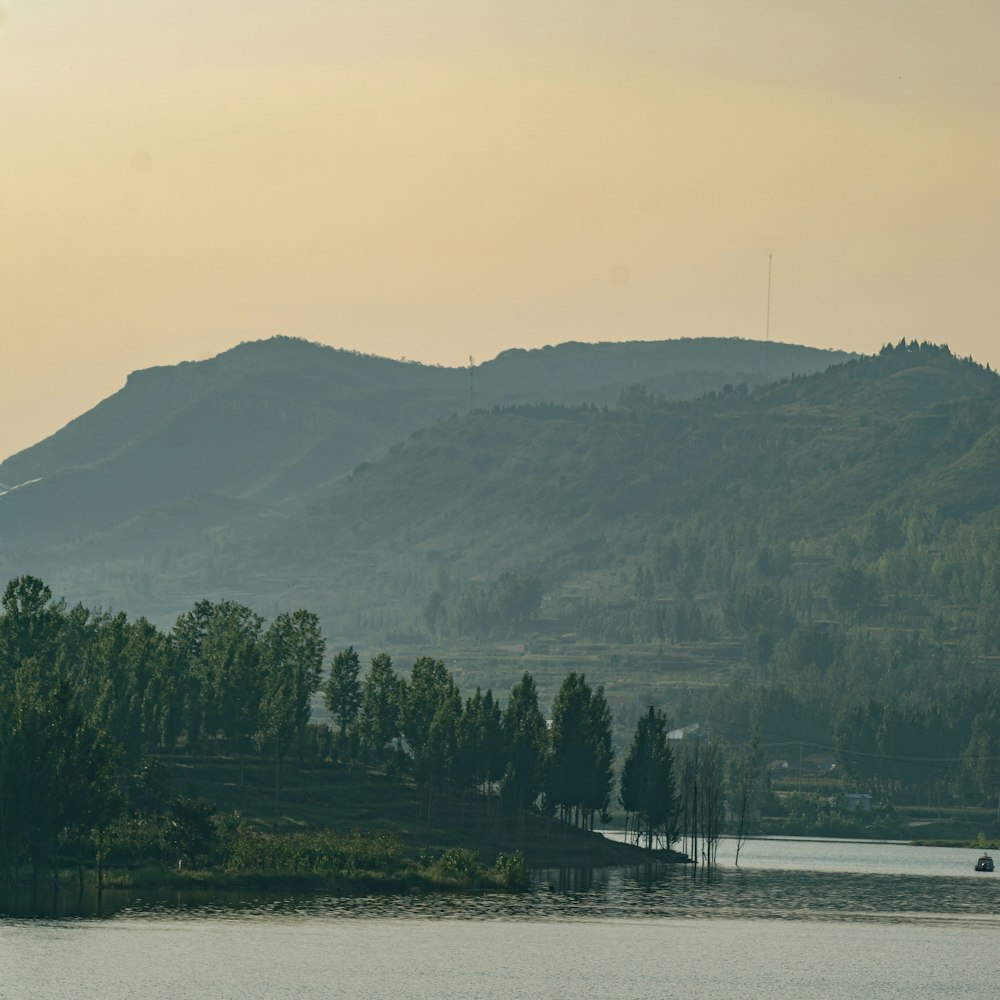 a lake with a mountain in the background