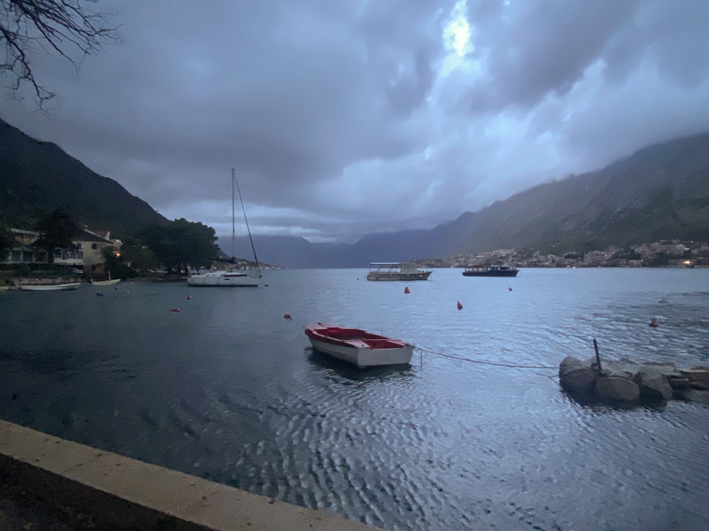 a body of water with boats floating on it