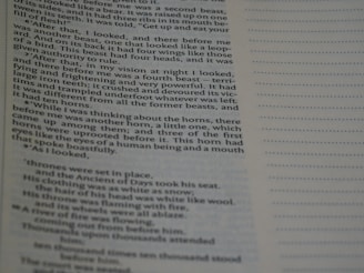 A close-up view of a printed page with a column of text on the left and a lined section for notes on the right. The text is clearly readable and appears to be from a book, with paragraphs and indented dialogue or quotes.