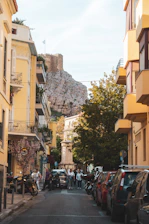Sunlit ancient medina streets in Tripoli bustling with local life.