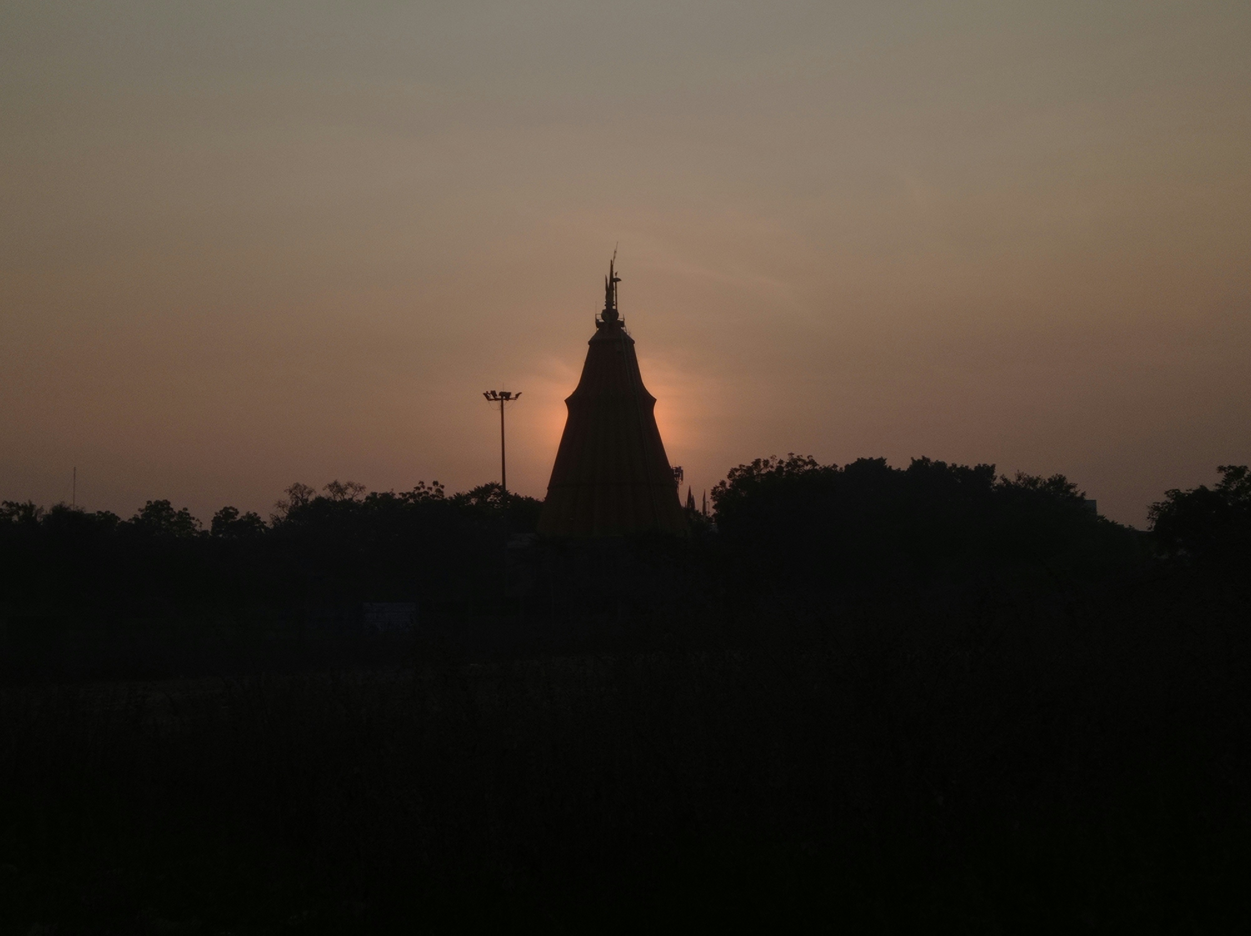 Sunset behind temple