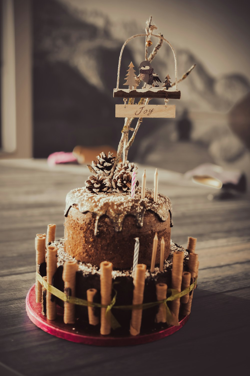 a cake sitting on top of a wooden table