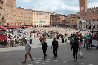 A picturesque image of a vibrant Italian piazza bustling with locals and tourists.