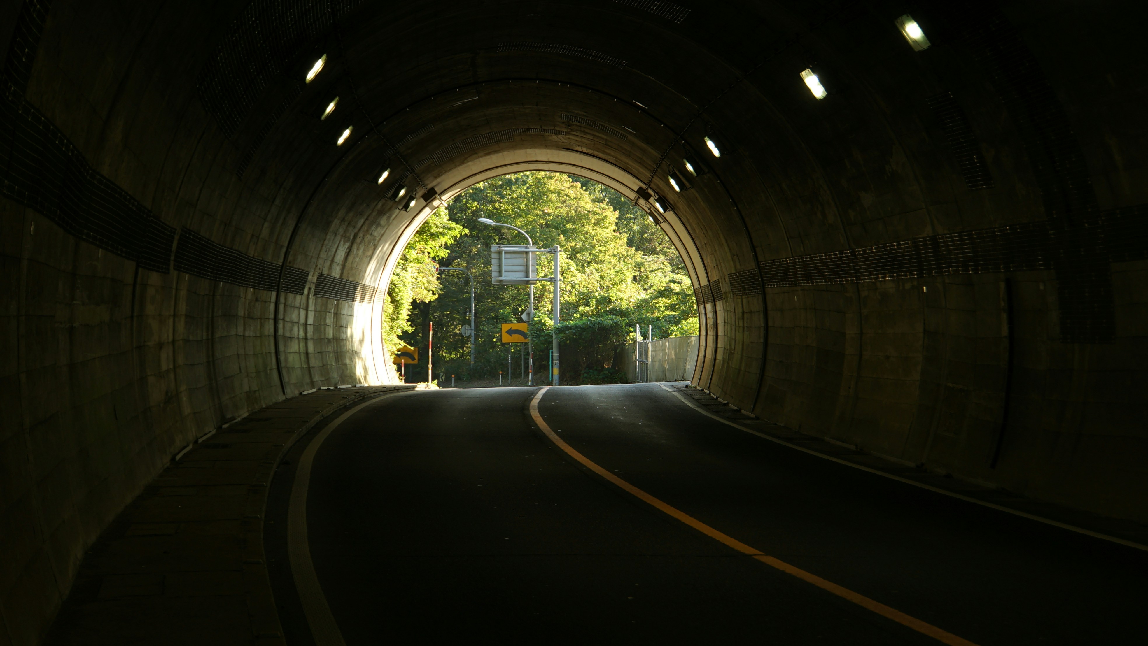 a dark tunnel with a light at the end