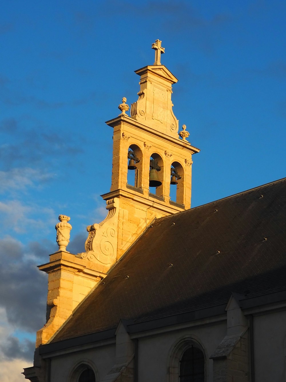 a church steeple with a clock on it