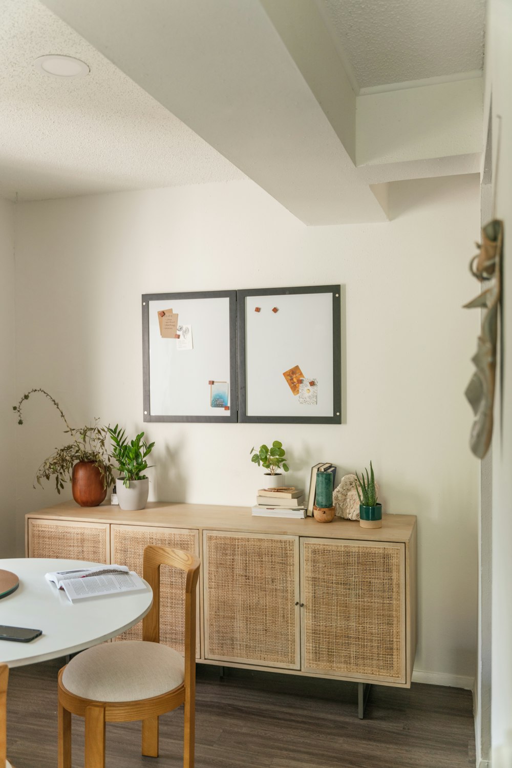 a dining room with a table and chairs