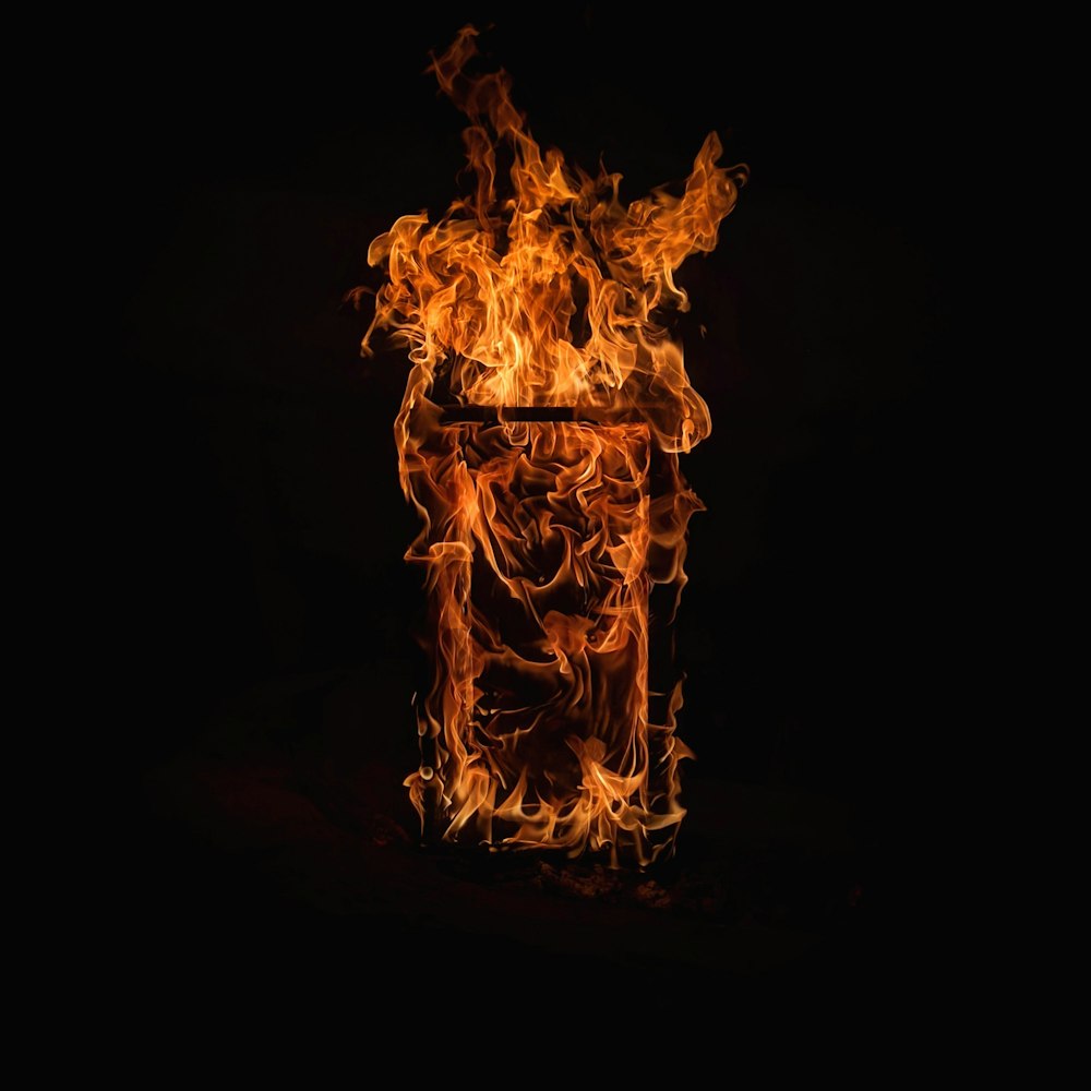 a fire can is shown in the dark