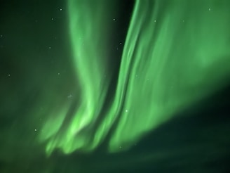 Footage of mysterious lights dancing in the night sky.