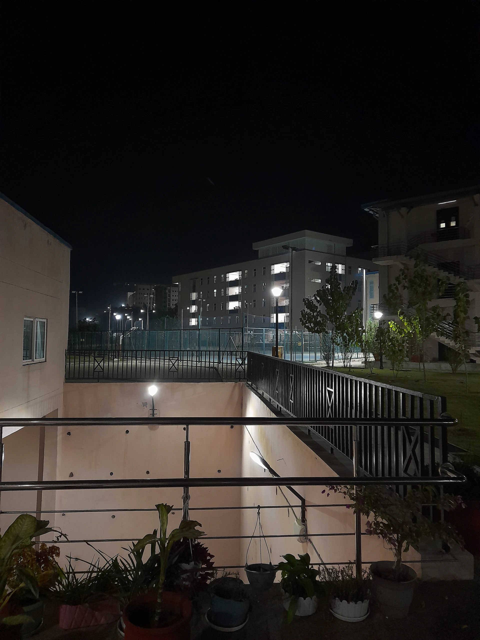 woman wearing yellow long-sleeved dress under white clouds and blue sky during daytime