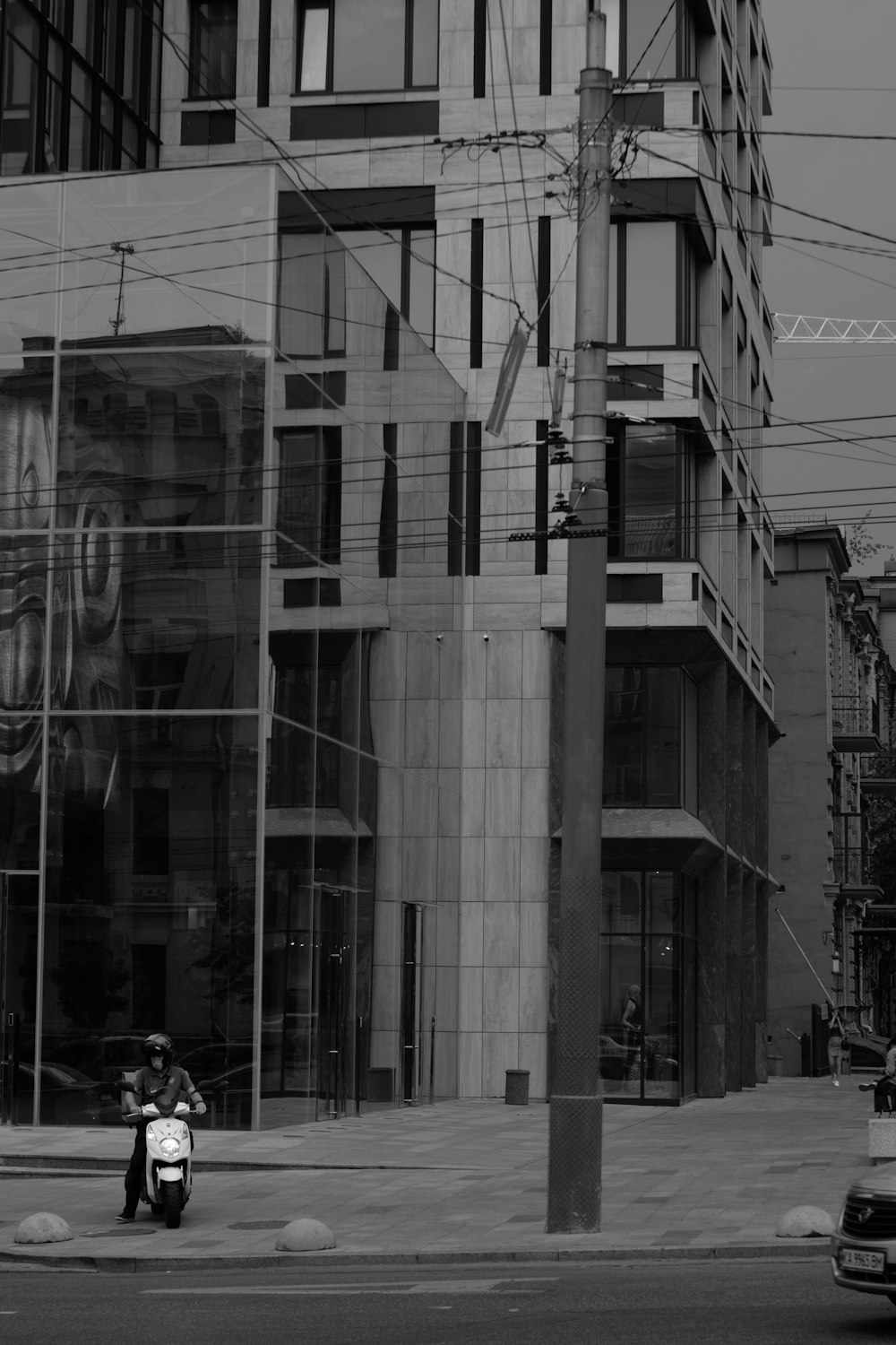 a person riding a motorcycle on a city street