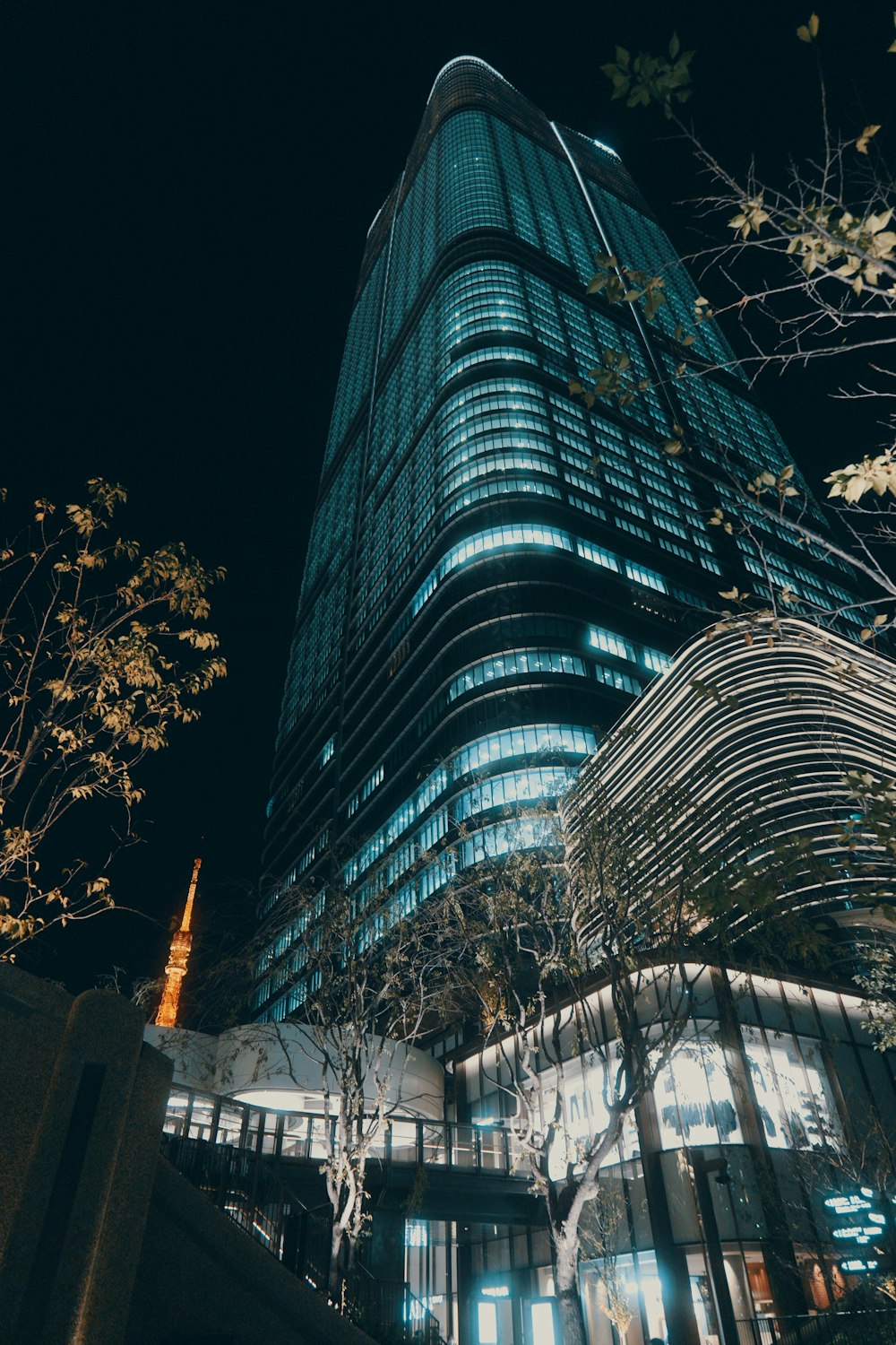 a very tall building lit up at night