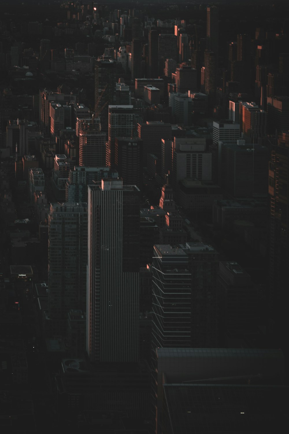 an aerial view of a city at night