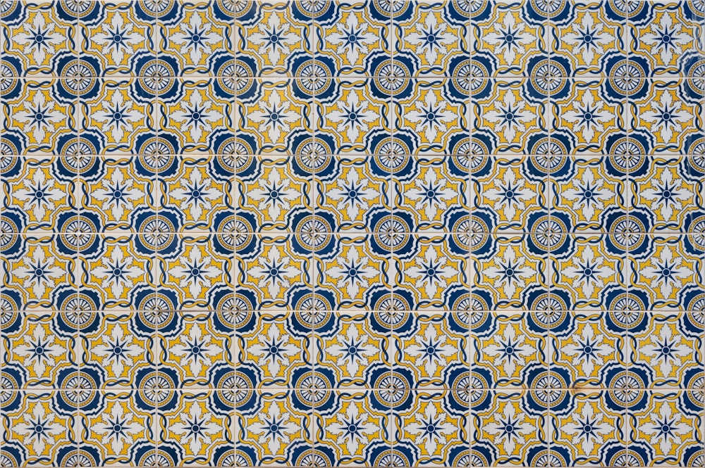 a blue and yellow pattern with a white background