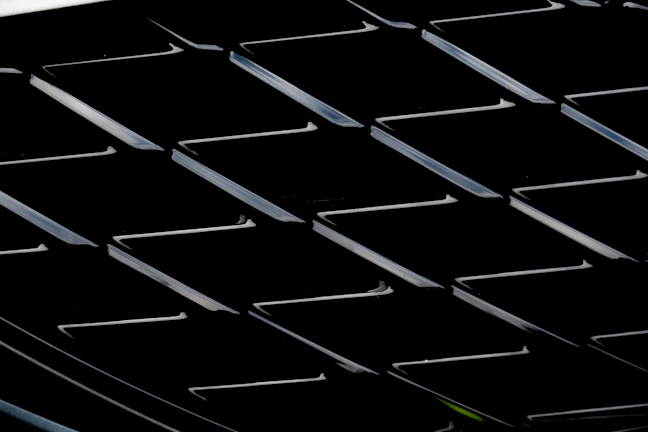 Grid layout showing various hinge models displayed on a sleek dark background.