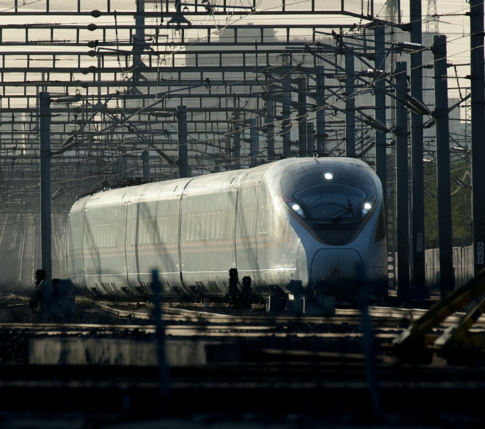 a train on the tracks in a train station