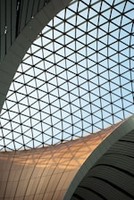 a view of the ceiling of a modern building