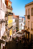 A vibrant street scene in Rio de Janeiro with colorful buildings and locals enjoying a sunny day.
