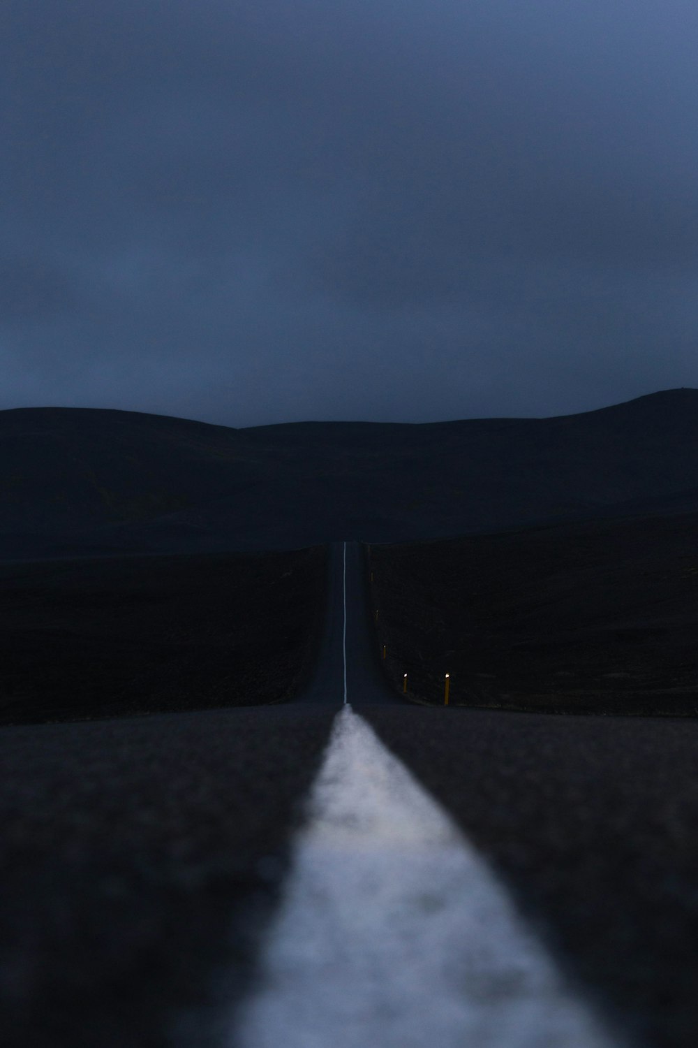 a long straight road in the middle of nowhere