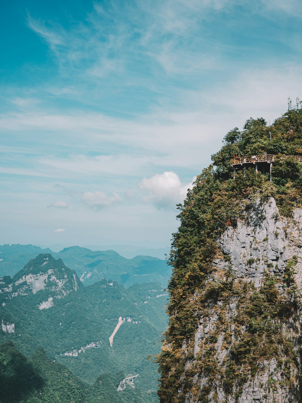 a view of the mountains from the top of a mountain