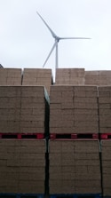 Close-up of eco-friendly building materials stacked neatly on a construction site.