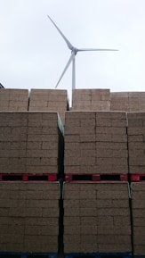 Close-up of eco-friendly building materials stacked neatly on a construction site.