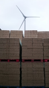 Close-up of eco-friendly fly ash bricks stacked neatly at a construction site.