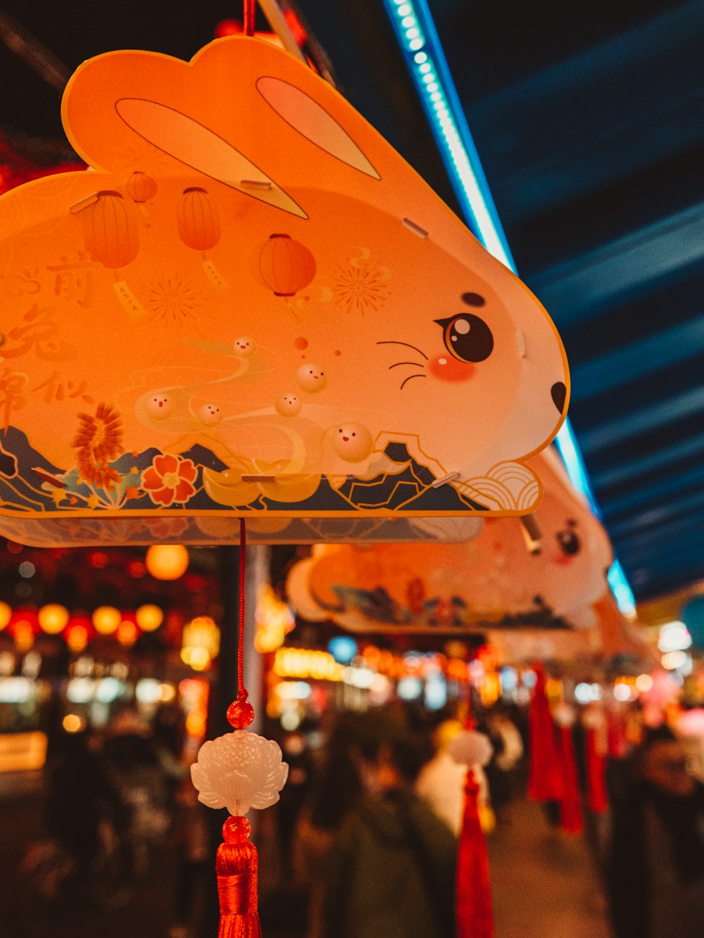 a close up of a lantern with a rabbit on it