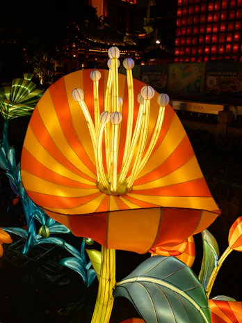 An interactive art installation featuring floral motifs inspired by Xochimilco’s unique flora, illuminated at night.