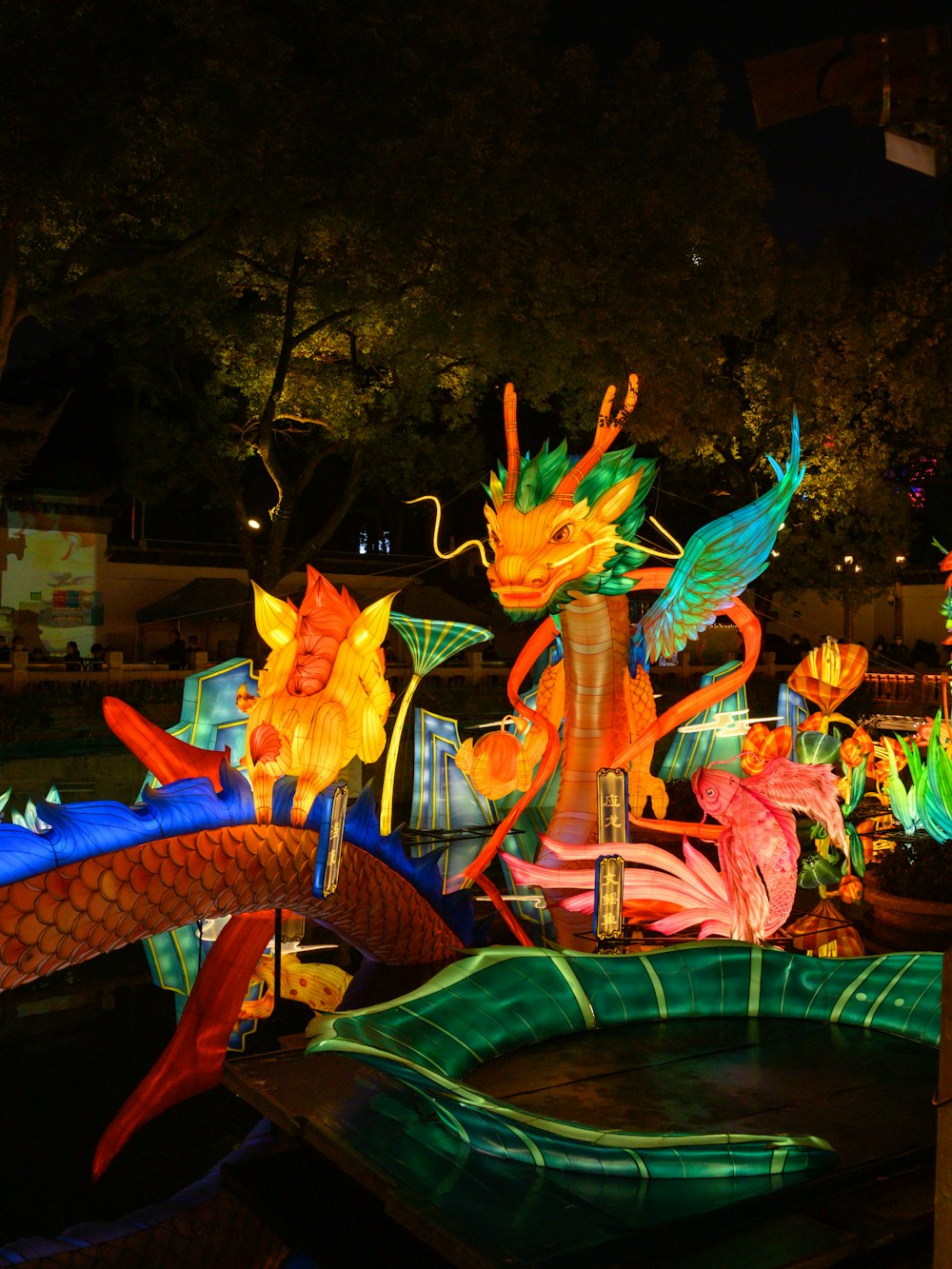 a display of colorful glass sculptures in a park
