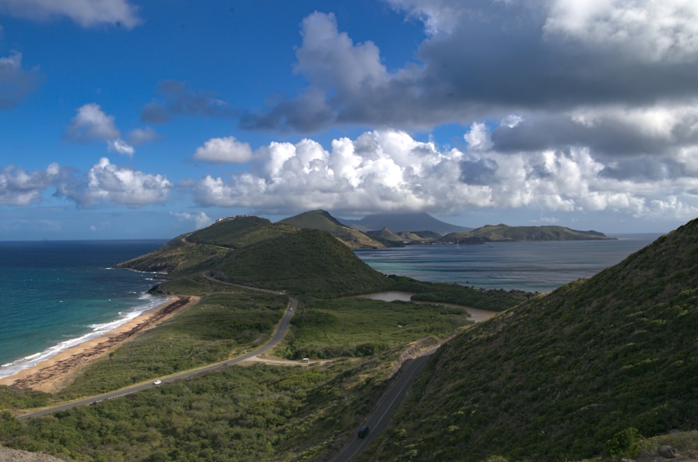 a scenic view of the ocean from a hill