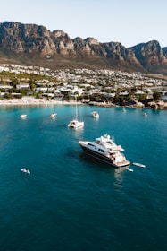 a large white boat in the middle of a body of water