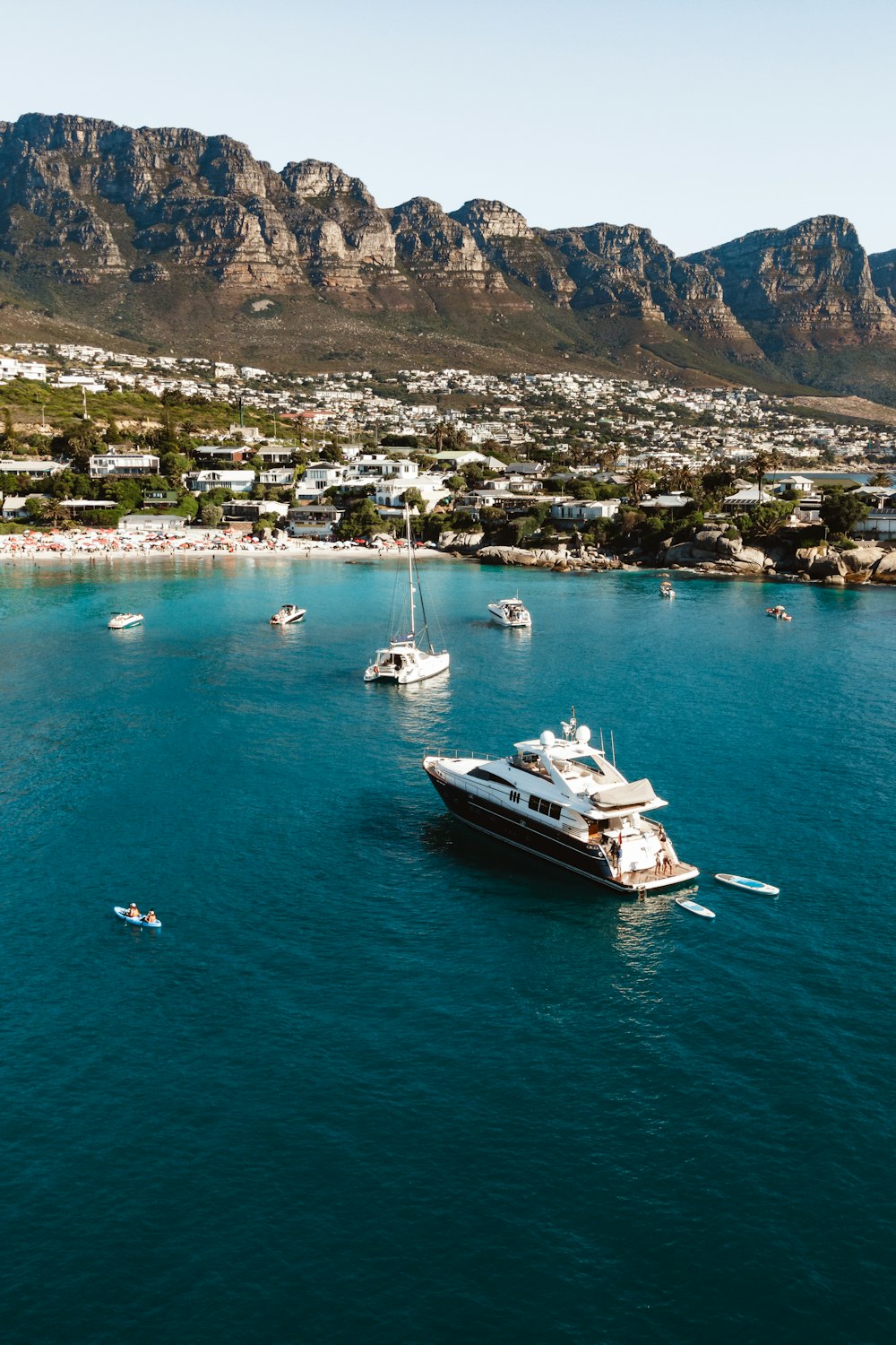 a large white boat in the middle of a body of water