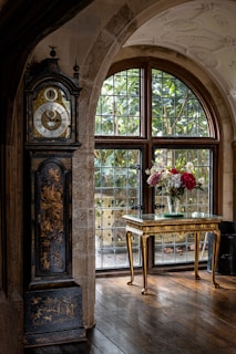 Sophisticated grandfather clock in a cozy living room.